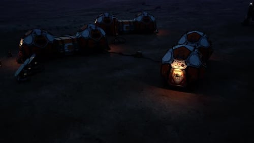 Mars Colony Base Illuminated at Night with Modular Habitats and Equipment