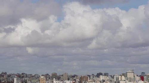 Cityscape under Cloudscape on Overcast Day
