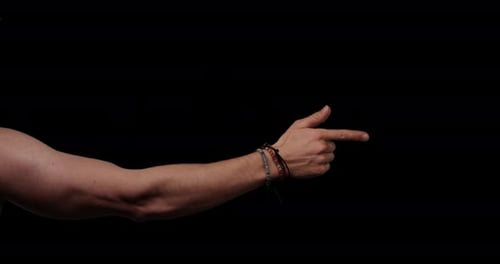 Hand gestures with alpha channel. Pre keyed. Pointing at something, rearside, muscular male hand, wr