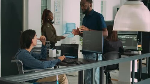 Asian Software Developer with Chronic Disability Working on Server Coding