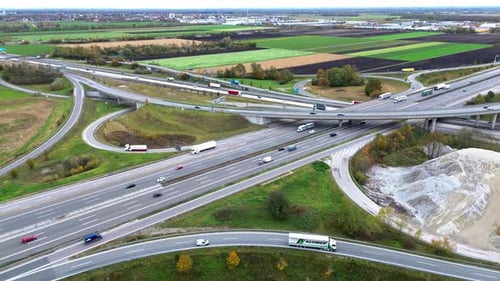 Aerial Drone Footage 4k of highway with traffic and interchange