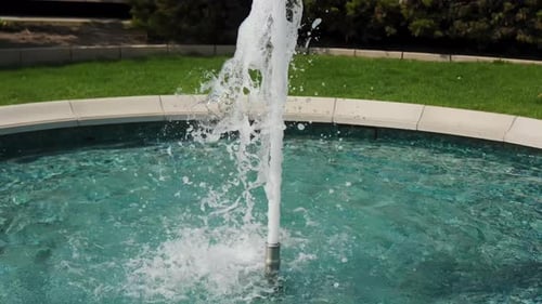 Beautiful Fountain in City Park on Sunny Day Time