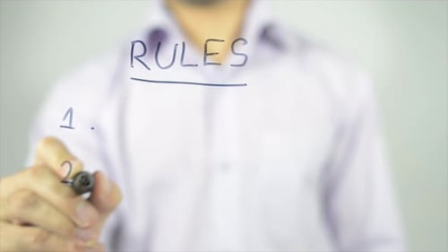 Hand Writes Rules on a Transparent Surface