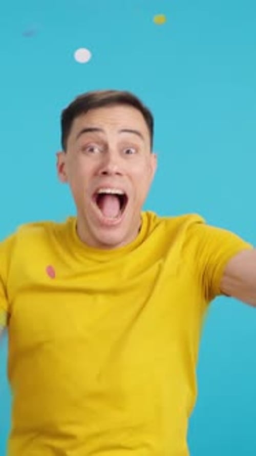 Crazy and Funny Man Dancing As Confetti Falls on Him