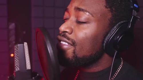 Inspired Black Singer is Singing Romantic Song in Recording Studio Creating New Album