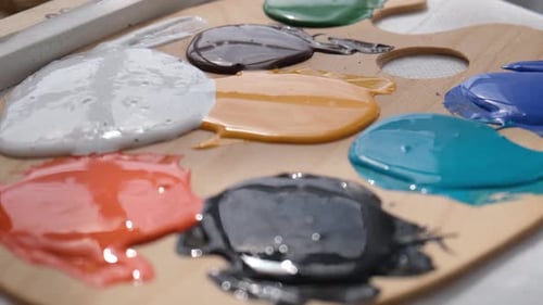 An Artist Works on an Abstract Oil Painting in a Workshop The Concept of Drawing a Picture