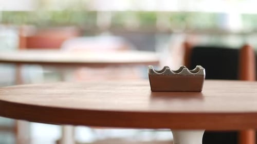 Cozy Cafe Interior with Minimalist Design and Wooden Tables