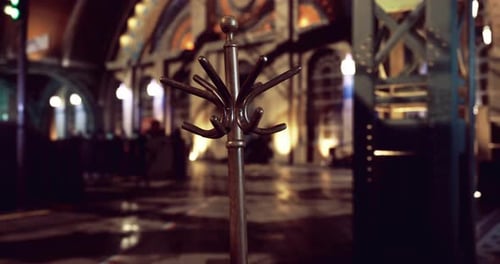 Atmospheric Spinning Coat Rack in Vintage Interior Animation