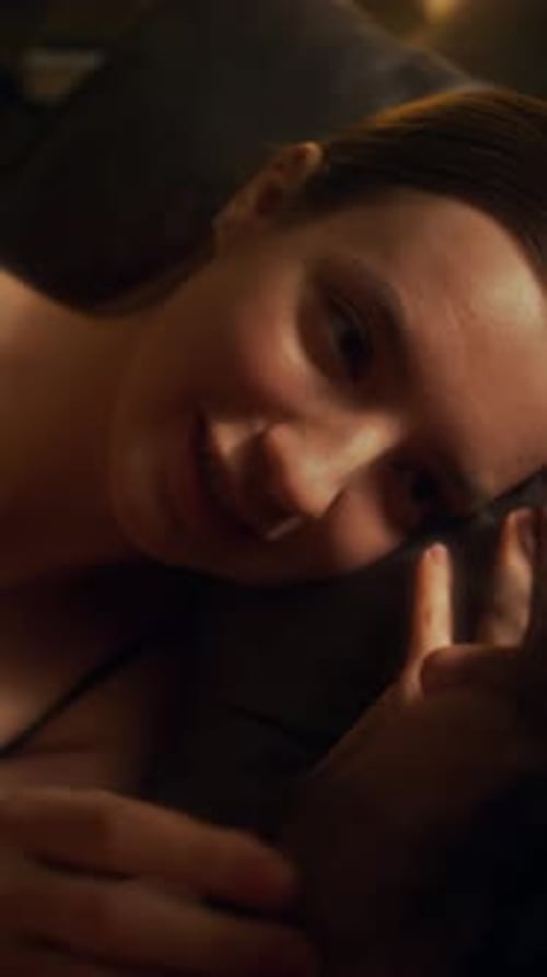 Loving Couple Lie Together Indoors