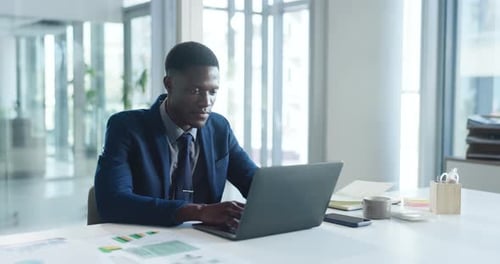 Office, employee and man with laptop, typing and financial analysis on website