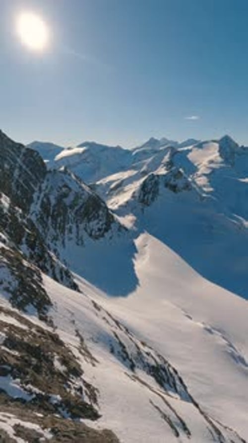 Panorama of Snowy Alps Mountains in Winter Landscape