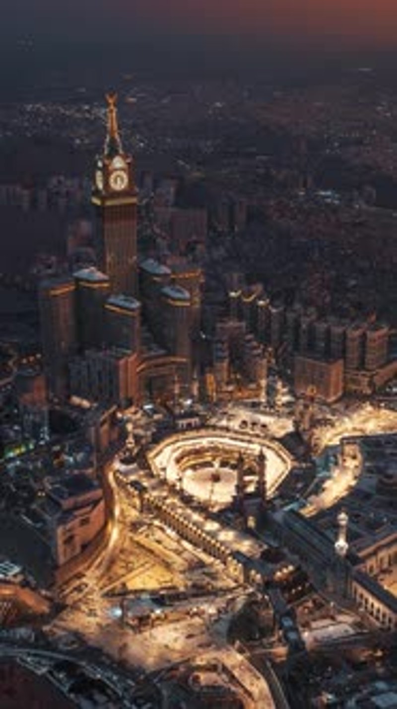 Sunrise aerial view of Mecca Grand Mosque and Clock Tower, Buildings ...
