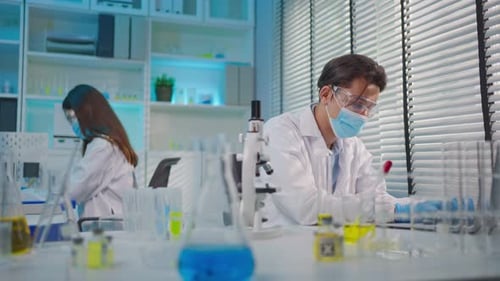 Scientists Working in Modern Medical Laboratory