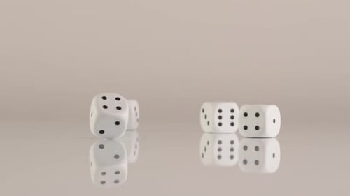 White Dice Rolling on Shiny Surface