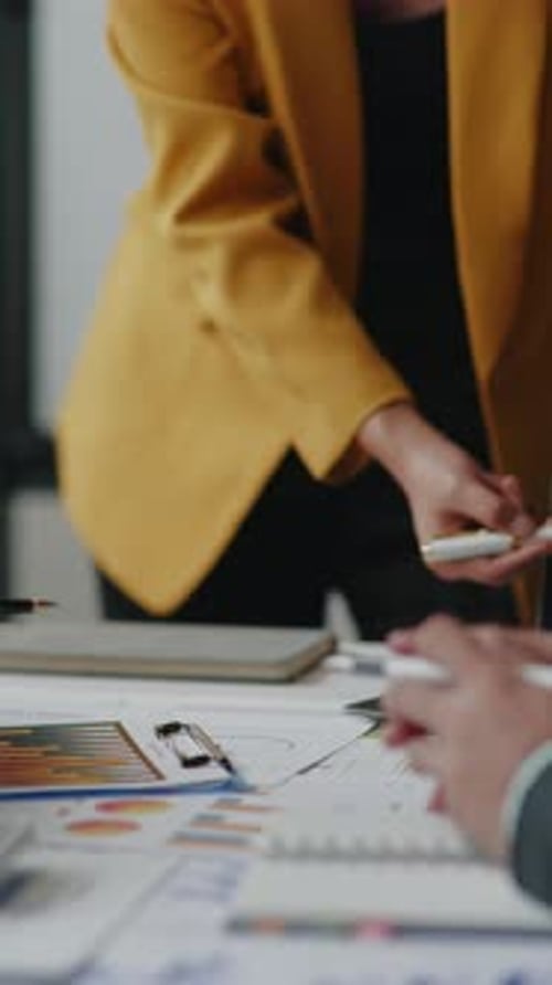 Vertical footage of Close up of hand teamwork business group are meeting working and brainstorming