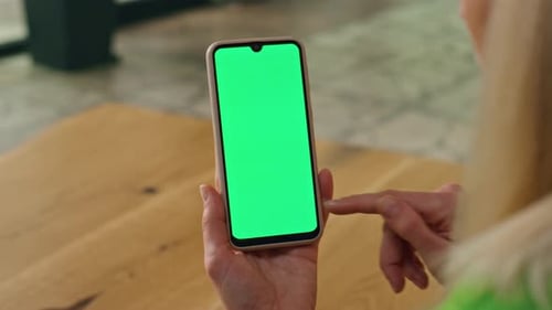 Executive Finger Touching Greenscreen Telephone at Office