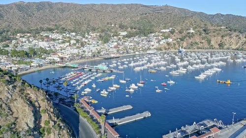 Boats yachts at anchor in Catalonia Island harbor Aerial view from drone