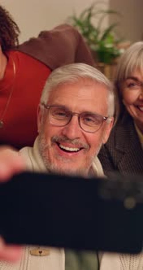Multi-Generational Family Takes a Selfie at Home