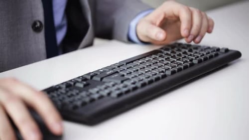 People, Business, Technology And Office Work Concept - Closeup Of Businessman Hands Typing On Com...