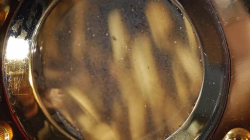 Close up of Barley in Metal Container