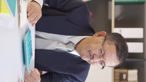 Vertical video of Frustrated businessman.