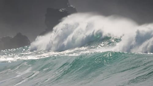 A Stunningly Beautiful Ocean Wave Captured On A Bright Sunny Daytime By The Beachside Slow Motion