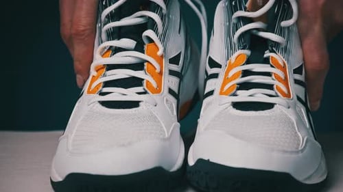 Pair of Athletic Shoes on Display Close Up