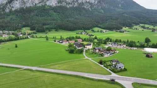 Aerial view of alpine mountains and fields