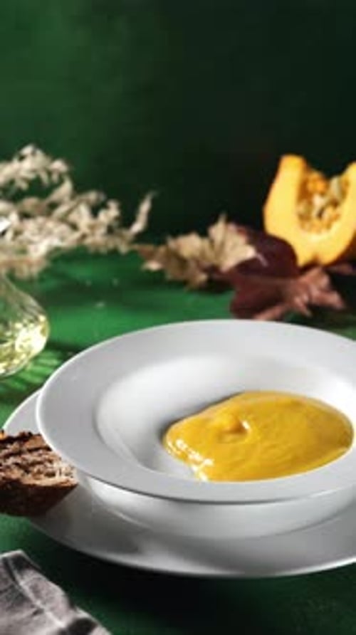 Pouring Pumpking Soup in a Plate