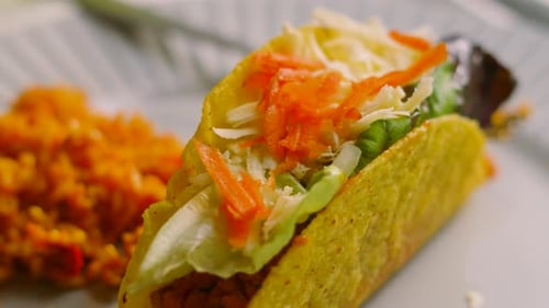 Delicious Taco on a Plate with Rice