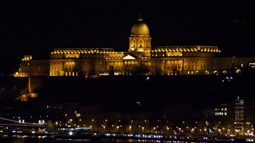 Budapest city (Hungary capital) center view with illuminated Buda Castle and Danube river at night,