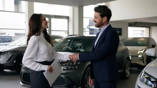 Caucasian Business Man Client Handshaking Saleswoman Woman Showroom Buying Car Businessman Guy Male