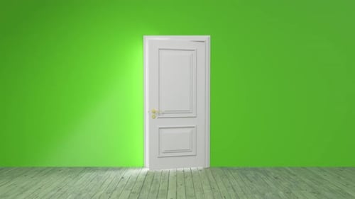 White door opening on green wall with light coming in