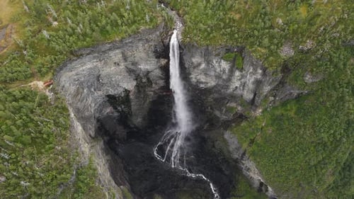 Vettisfossen waterfall and canyon made by the water in Norway. Rising up Drone footage