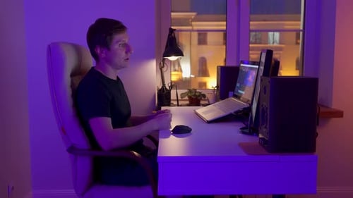 Young Man Having a Videocall By His Desk at Home in the Living Room Timelapse
