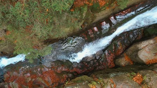 Aerial Over Small Waterfall