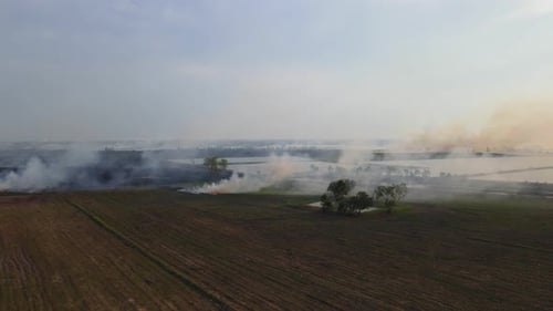 Aerial View of Rural Landscape Engulfed in Flames