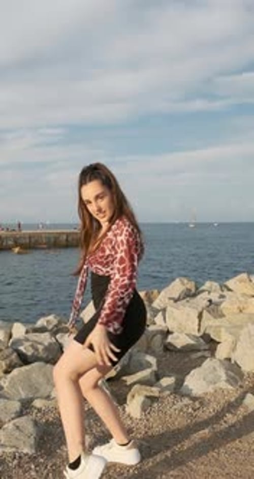 Woman Performing a Dance Outdoors By the Sea
