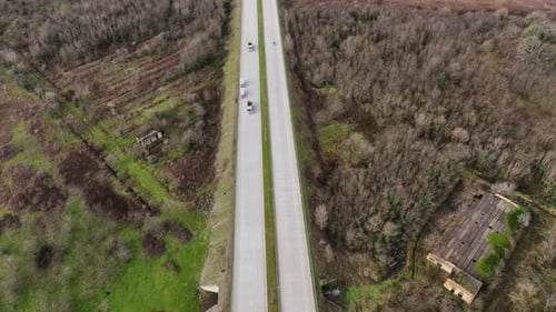Aerial View of Vehicles on Rural Highway