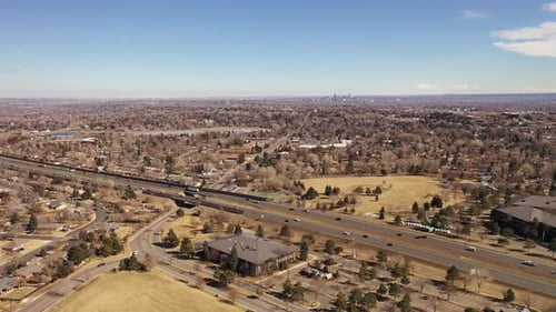 A pan along I 70 capturing Denver on the horizon