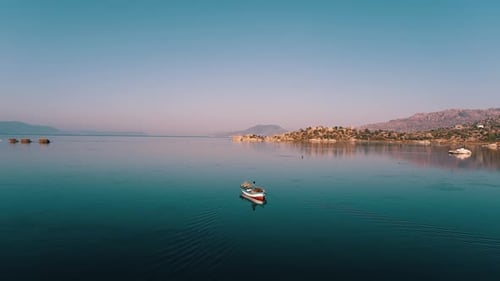 Small Fishing Boat On A Lake
