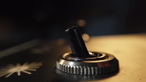 Finger flicks electronic toggle switch