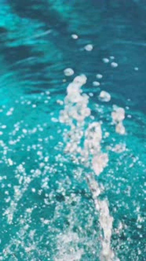 Vertical video the pool water splashing