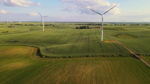 Renewable Energy Wind Generator Produces Electricity Wind Turbine Blades Turning Gracefully in Rural