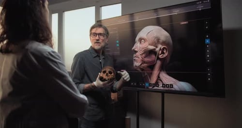 Scientists Conduct Historical Research Big Screen Shows 3D Visualization of Human Anatomy