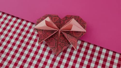 Origami Paper Heart on Colorful Background