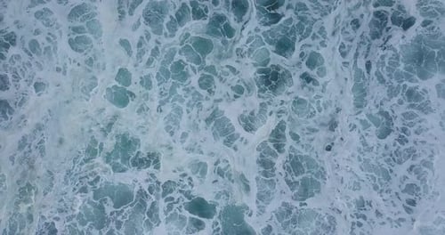 overhead drone shot of sea waves with white foam. sea 4K videos. abstract footage.
