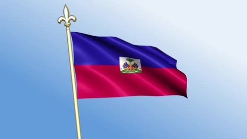 Haiti Flag Waving on Flagpole Against Blue Sky