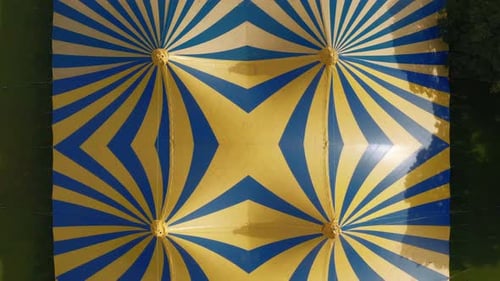 Aerial view of colorful tents and geometric patterns, North Berwick, Scotland.