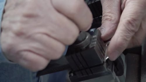 Hispanic man working on key duplication with special Manual work concept. Close-up